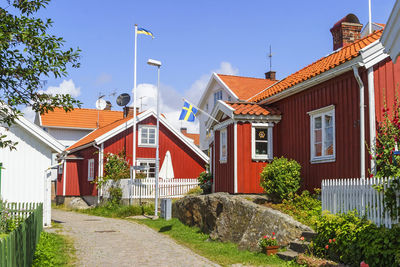 Idyllic red cottages in a swedish fishing village