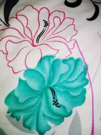 High angle view of flower petals on bed