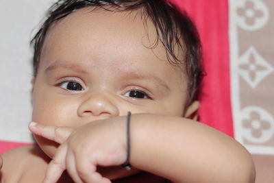 Portrait of cute baby girl at home