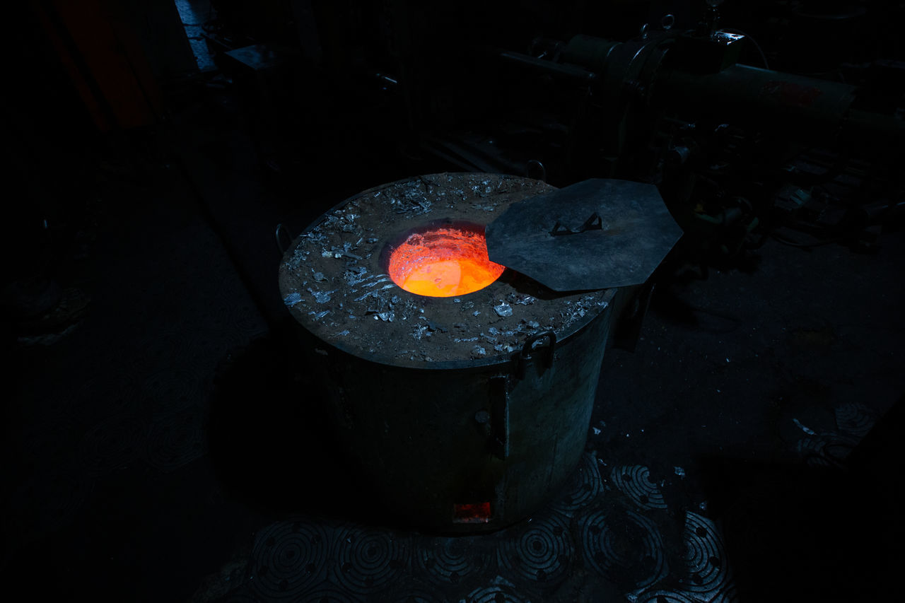 CLOSE-UP OF A BURNING CANDLE