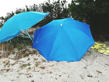 Scenic view of tent on field against sky