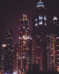 Low angle view of illuminated buildings