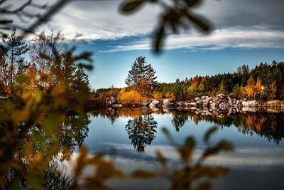 Scenic view of lake against sky during autumn