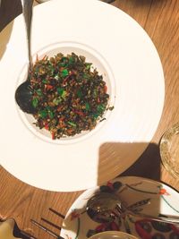 High angle view of vegetables in plate on table