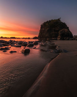 Scenic view of sea against sky during sunset