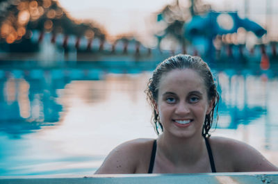 Portrait of smiling woman in swimming pool