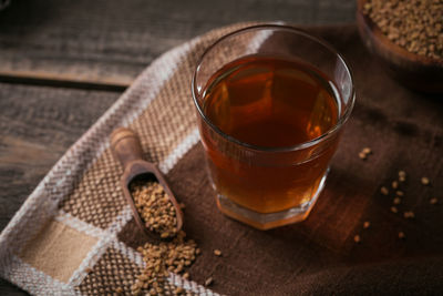 Egyptian fenugreek yellow tea or methi dana drink and fenugreek seeds