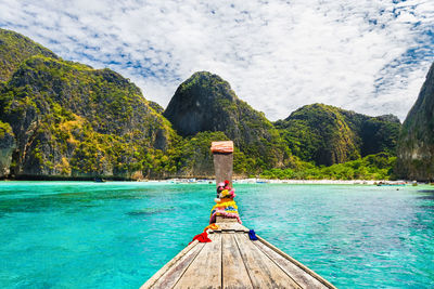 Scenic view of sea against mountain