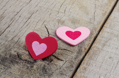 High angle view of heart shapes on wooden table