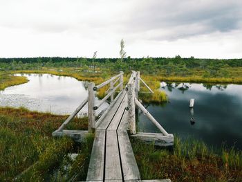 View of footbridge over lake