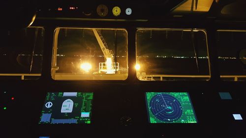 Close-up of airplane at night