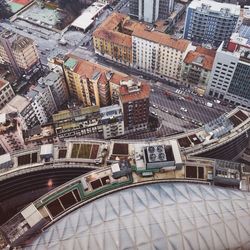 High angle view of street amidst buildings in city