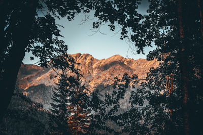 Scenic view of mountains against sky during sunset