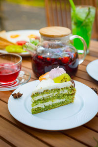 Close-up of cake served on table