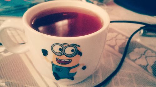 Close-up of coffee cup on table