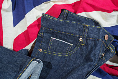 Low section of woman against wall