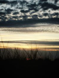 Scenic view of dramatic sky during sunset