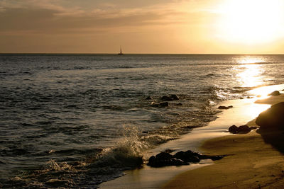 Scenic view of sea against sky during sunset