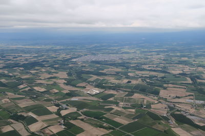 High angle view of buildings in city against sky