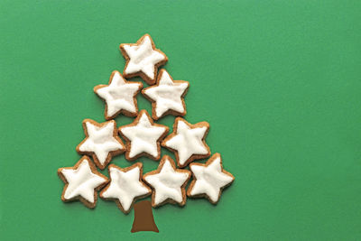 Christmas decorations on green background