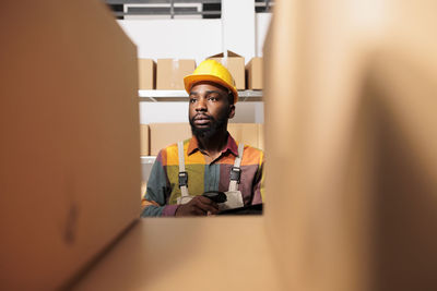 Portrait of man working in office