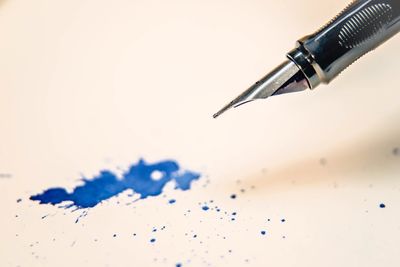 Close-up of pen against white background