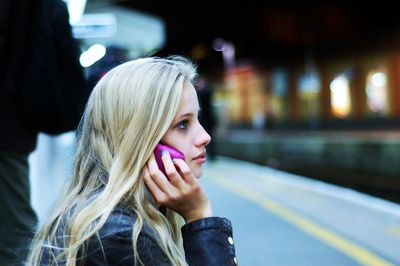 Close-up of woman using phone