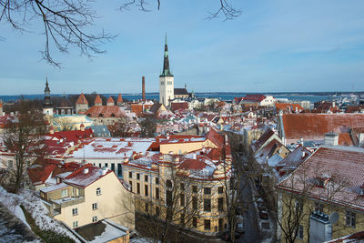 High angle view of st olaf church with cityscape against sky