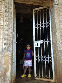 Full length of girl standing outdoors