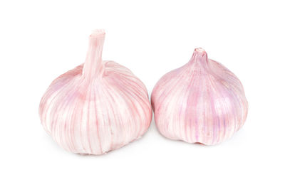 Close-up of garlic against white background