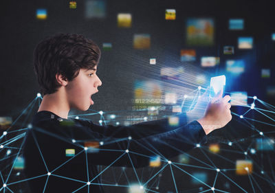 Digital composite image of man using smart phone