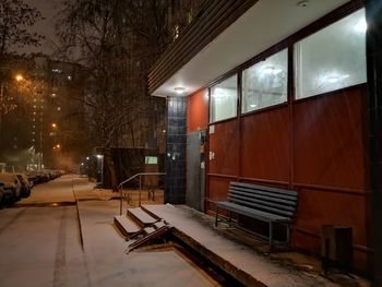 Empty benches in winter at night