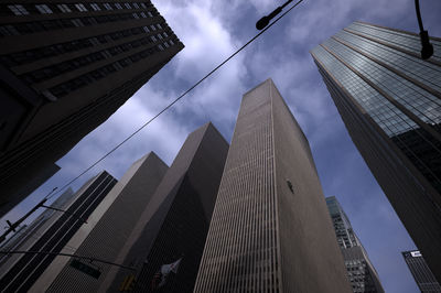 Low angle view of skyscrapers against sky