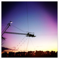 Electricity pylons at sunset