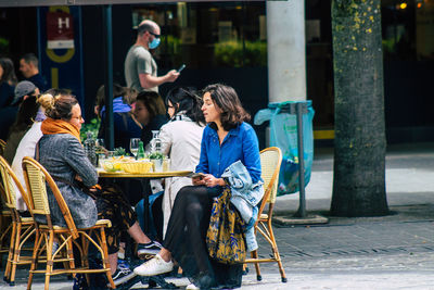 People sitting on table at restaurant
