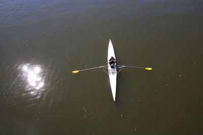 High angle view of man in boat in sea