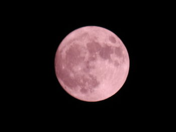 Scenic view of full moon against clear sky at night