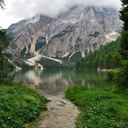 Scenic view of river and mountains