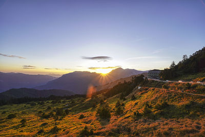 Scenic view of mountains against sky during sunset