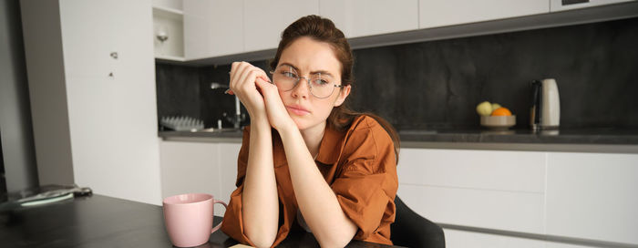 Young woman using mobile phone