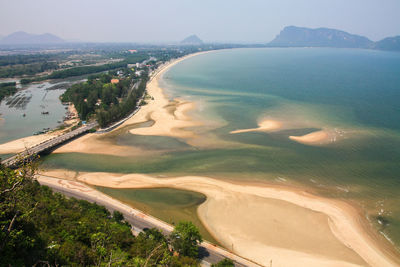 High angle view of sea shore against sky