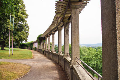 Colonnade against clear sky