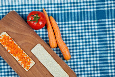 High angle view of fruits on cutting board