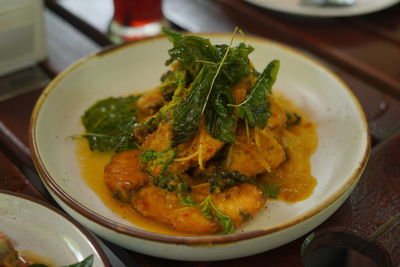 High angle view of fish in bowl on table