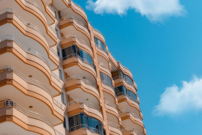 Fragment of a modern residential exterior of an apartment building.