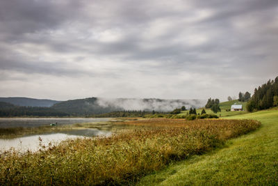 Scenic view of lake remoray in the doubs department in summer