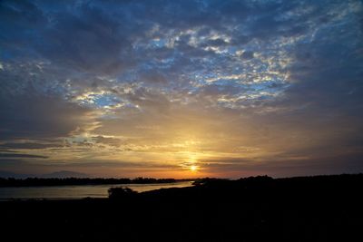 Scenic view of dramatic sky during sunset