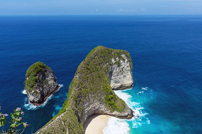 High angle view of rocks in sea