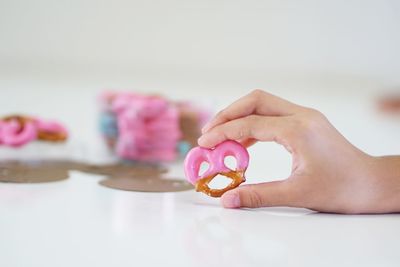 Close-up of hand holding ice cream