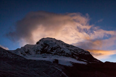 Scenic view of snowcapped mountains against sky during winter